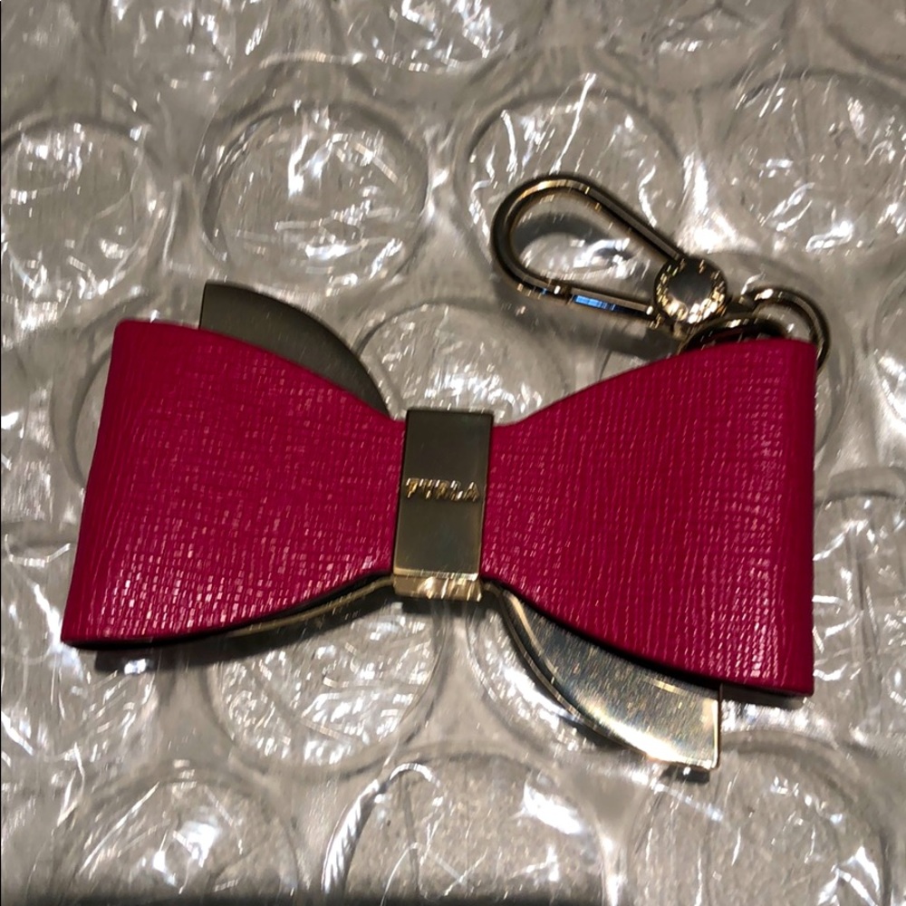 Furla Venus saffiano leather bow key chain.